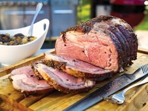 Roast to perfection with the Weber Grill Rotisserie Kit, perfect for slow cooking chicken, lamb, ribs, or turkey. Includes spit, forks, and motor for easy use.