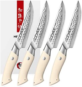 "Elevate your dining experience with this 4-piece steak knife set featuring 67-layer damascus steel and hammered finishes. Perfect for Western-style food preparation, these ivory-white handled knives are a must-have for any kitchen."
