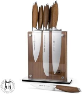 Discover the Schmidt Brothers Bonded Teak 7-Piece Knife Set, featuring high-carbon stainless steel cutlery and a midtown acacia acrylic magnetic knife block for effortless organization.