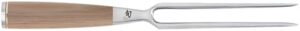 Discover the art of carving with the Premier Blonde 6.5" Carving Fork, handcrafted in stainless steel with a durable Pakkawood handle. Pair it with your Shun Premier Slicing Knife for effortless serving and presentation.