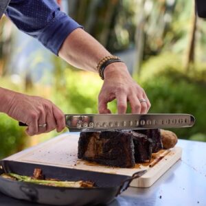 Here's a meta description that meets the requirements:

"Elevate your meat carving game with this handcrafted Japanese 12" brisket knife featuring VG-MAX core and Damascus stainless steel cladding. Includes wooden saya sheath and Pakkawood handle. Limited time offer: get 15% off!"