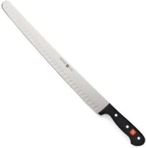 Discover a culinary edge with this Gourmet 14" Hollow Edge Brisket Knife, perfect for slicing meats with precision. Enjoy discounts and offers on this high-quality kitchen essential.
