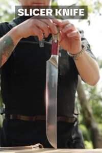 Discover the ultimate slicing experience with Valhalla's 12" Slicer featuring 9CR18MOV HC Steel and razor-sharp blade. Perfect for carving, BBQ, and brisket - all in a stylish red resin & wood handle design.