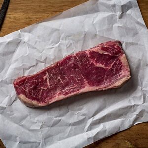 Experience the rich flavor of Nebraska Star Beef's New York Strip End-Cut steaks, hand cut and trimmed for a tender bite. Enjoy all-natural goodness delivered to your doorstep with every order.