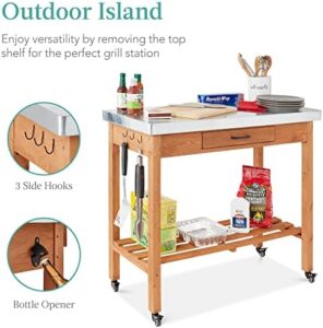 "Maximize your outdoor entertaining space with this versatile table and storage cabinet featuring a stainless steel top, 4 locking wheels, and grill accessory hooks. Perfect for patio kitchens or bar carts, dimensions: 30x24.5x37.5 inches."