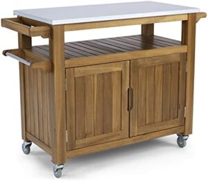 Discover the Homestyles Maho Brown Outdoor Cart, perfect for outdoor gatherings or backyard BBQs. With its sturdy construction and generous storage space, keep your essentials within reach.