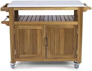Discover the Homestyles Maho Brown Outdoor Cart, perfect for outdoor gatherings or backyard BBQs. With its sturdy construction and generous storage space, keep your essentials within reach.