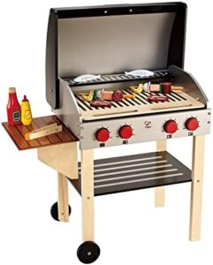 "Develop your little chef's skills with Hape's Wooden Gourmet Grill and Shish Kabob playset, featuring realistic play food and utensils. Perfect for imaginative play and learning!"