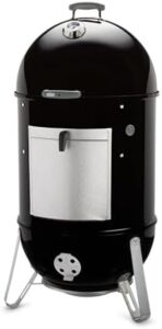 Cook up delicious BBQ with Weber's 22-inch Smokey Mountain Cooker, charcoal smoker perfect for outdoor enthusiasts. Compact design, durable construction.
