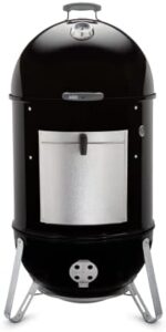 Cook up delicious BBQ with Weber's 22-inch Smokey Mountain Cooker, charcoal smoker perfect for outdoor enthusiasts. Compact design, durable construction.