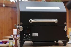 Here is the output:

"Perfect for camping, tailgating or backyard grilling, this portable pellet grill smoker features a peaked lid, 8.5LB hopper capacity and timer - ideal for perfecting your BBQ skills."