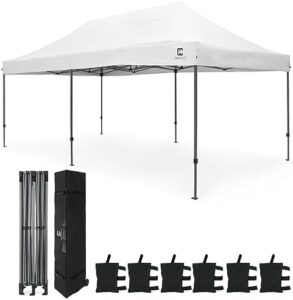 Here is the optimized meta description:

"Set up your outdoor space quickly with CAPHAUS' 10x20 ft pop-up canopy. Heavy-duty and portable, it's perfect for camping, patios or parties. Includes wheeled carry bag and weight bags. Get yours today and enjoy!"
