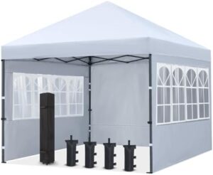 Elevate your outdoor events with the Cooshaide 10X10Ft pop-up canopy tent, featuring a elegant church window design and instant folding setup. Perfect for weddings, BBQs, and more, this white shelter provides ample space and style.