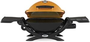 Perfect outdoor cooking experience with Weber Q1200 Liquid Propane Grill, Orange. Compact and portable, ideal for camping or backyard gatherings, with 280 sq in grilling area and adjustable heat control.