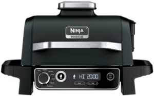 Unlock the perfect outdoor grilling experience with Ninja's 7-in-1 OG705CO grill & smoker. Grill, BBQ, air fry, roast, and dehydrate with woodfire pellets in a portable and weather-resistant design.