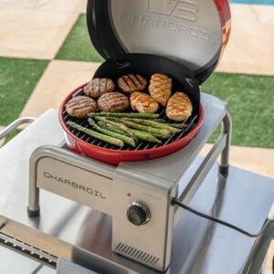 Here is the meta description:

"Sear to perfection with Bistro Pro's compact electric grill in red. Compact design for small spaces. Perfect for camping trips or backyard gatherings. No assembly required. Cook like a pro!"