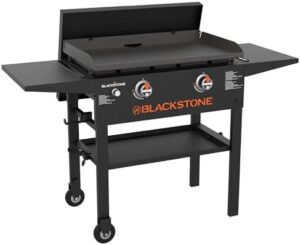 Cook up a feast with the Blackstone 2269 28" Original Omnivore Griddle, featuring powder coated steel and hard cover, perfect for outdoor cooking enthusiasts.