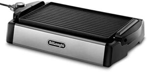 Experience the perfect cooking combination with De'Longhi's BGR50 Reversible Grill/Griddle, ideal for indoor/outdoor use, featuring 2 heat zones and adjustable height. Get ready to sizzle!