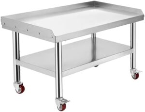 Elevate your grilling experience with this Stainless Steel Grill Stand Table featuring 1000 lb top shelf and 220 lb bottom shelf capacity, adjustable legs, and edge baffle for hotels, homes, and commercial kitchens. Perfect for indoor or outdoor use.